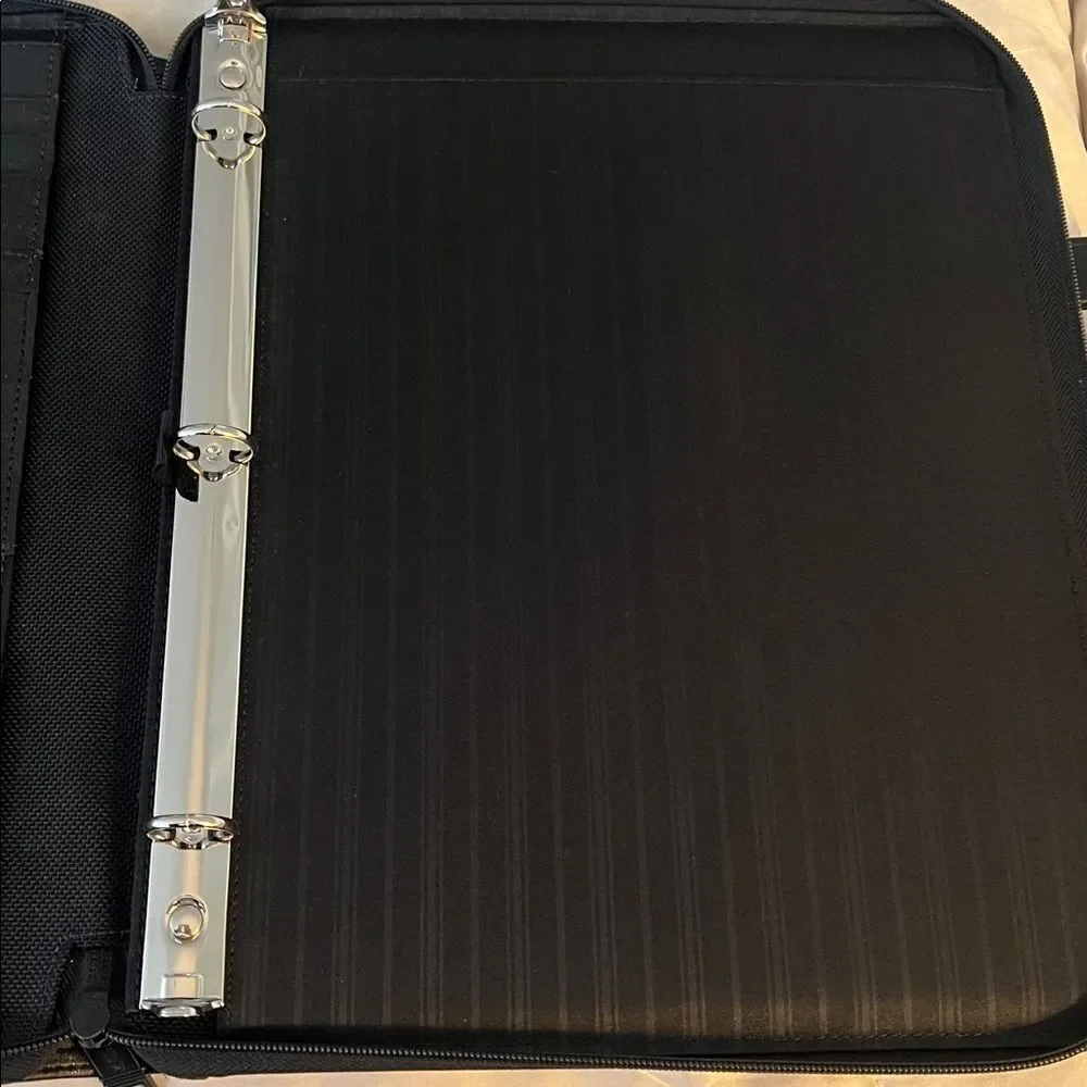 Tumi executive black leather portfolio case with pull out handles
